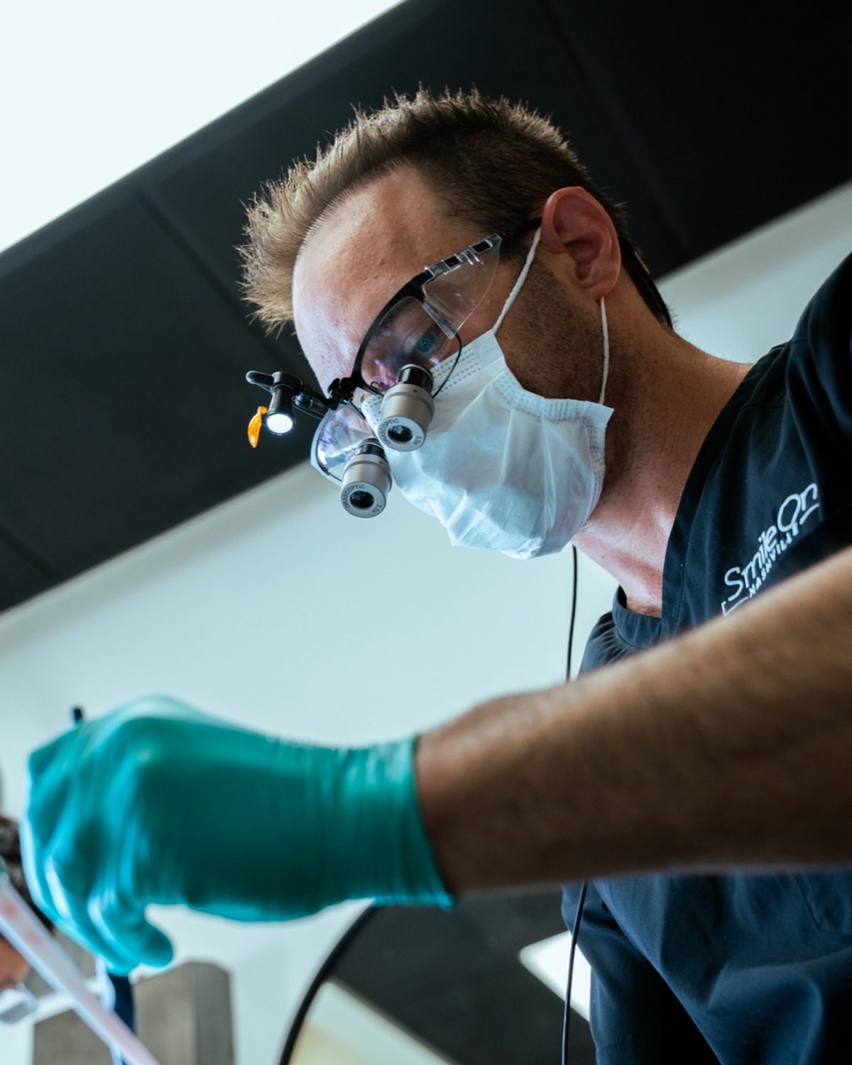 Dr. Trembley crafting a PERL smile in the studio
