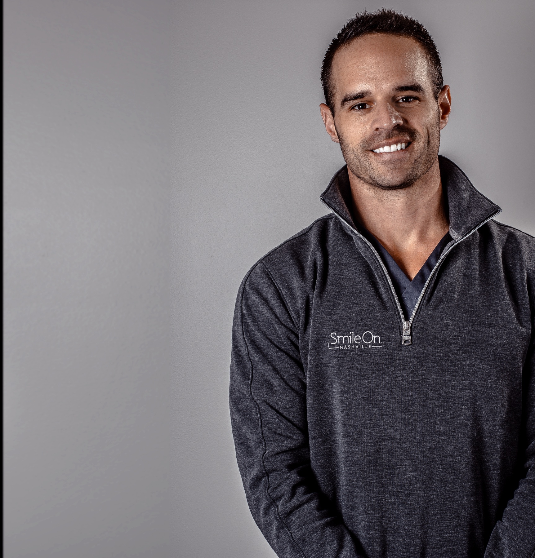 Dr. Jeff Trembley, lead cosmetic dentist at Smile On Nashville, in a Smile On Nashville studio portrait